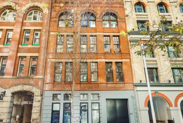 A front face view of a large brick Kent street building